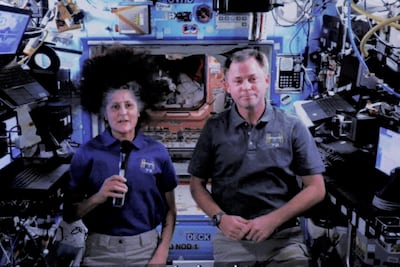 Nasa astronauts Sunita Williams and Nick Hague deliver a speech via video link during their time in space. Reuters