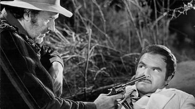 With Burt Reynolds in the 1975 film Lucky Lady. Getty Images