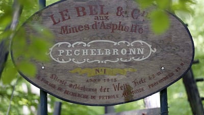 A commemorative sign is seen at the location of the world’s first ever prospective oil drilling site, built in 1813, in a forest near Merkwiller-Pechelbronn. Vincent Kessler / Reuters