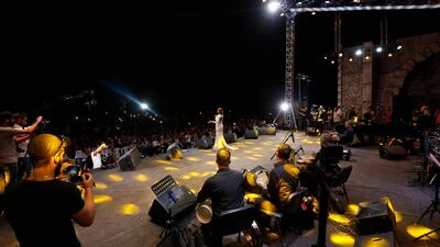 Lebanese singer and artist Carole Samaha sings in the historical citadel of Damascus during the Damascus Castle Festival, in Damascus, Syria, 13 July 2019. Photo: EPA / Youssef Badawi