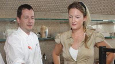 Sophia Money-Coutts watches the Zuma chef Colin Clague grilling sea-bass.