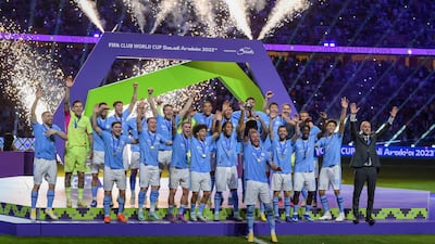 Pep Guardiola, right, celebrates with his players after Manchester City won the 2023 Fifa Club World Cup final in Jeddah, Saudi Arabia. It was the fifth trophy City would win that calendar year. Getty Images