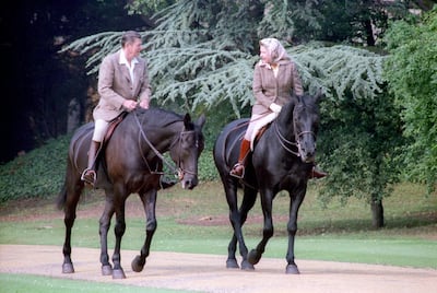Ronald Reagan, US president at the time, rides with Queen Elizabeth at Windsor Castle near London on June 8, 1982. Reuters