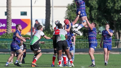 Jebel Ali Dragons win a lineout against Abu Dhabi Harlequins during the West Asia Premiership game. Victor Besa / The National