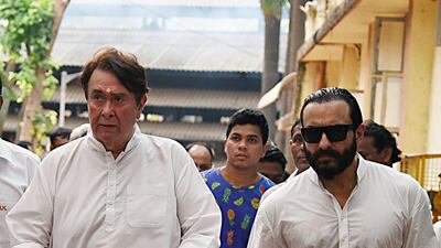 Actor Randhir Kapoor with son-in-law Saif Khan attend the funeral of his mother Krishna Raj Kapoor. AFP