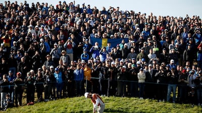 Tommy Fleetwood of England putts on to the seventh green during the 2018 Ryder Cup at The Golf National in Guyancourt, near Paris. EPA