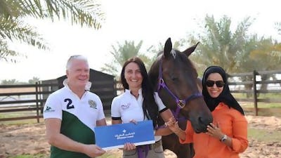 William Horsley, left, is sponsoring Cristina Calin, second from left, who is preparing Webster, second from right, for Reem Alabbar to compete with at international dressage events. Sanable Studio