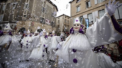 Performers put on a show on the final day of the Limoux Carnival in southern France. AFP