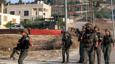 Israeli soldiers patrol the Palestinian village of Tel the day after the confrontation. AFP
