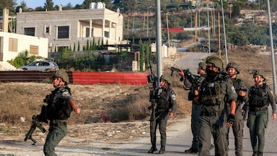 Israeli soldiers patrol the Palestinian village of Tel the day after the confrontation. AFP