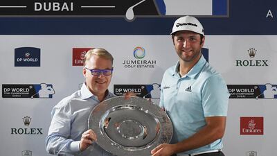 Jon Rahm, right, is presented with the Rookie of the Year award by European Tour Chief Executive Keith Pelley. Ross Kinnaird / Getty Images