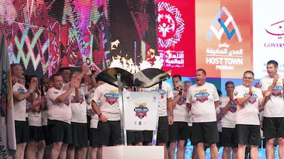 The torch arrives at Special Olympics Host Town closing ceremony in Global Village, Dubai. Reem Mohammed / The National