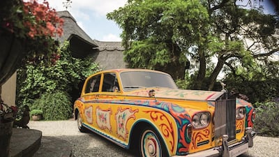 Artist Steve Weaver painted the sedan in the style of Romany caravans with flowers, zodiac signs and scrollwork. Courtesy Rolls-Royce