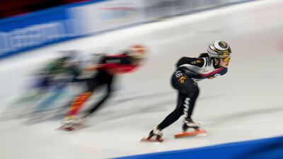 Kim Gilli of South Korea leads during the heats of the Women's 1,000m, at the ISU World Tour Short Track Speed Skating in Beijing. AP