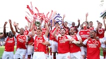 LONDON, ENGLAND - MAY 24: Martin Odegaard of Arsenal lifts the Premier League trophy as players of Arsenal celebrate, as they are crowned the Champions of the Premier League for the 2025/26 Season, after the Premier League match between Crystal Palace and Arsenal at Selhurst Park on May 24, 2026 in London, England. (Photo by Michael Regan / Getty Images For Premier League)