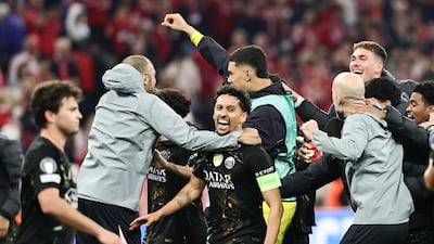 PSG players celebrate after their 1-1 semi-final second-leg draw earned them a 6-5 aggregate win over Bayern Munich. EPA