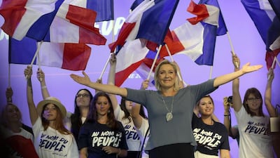 Marine Le Pen, president of France’s far-right Front National, waves to supporters during a meeting in Frejus, southern France, September 18, 2016. Claude Paris / AP Photo