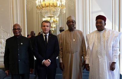 French President Emmanuel Macron with Mali's President Ibrahim Boubacar Keita (L), Chad's President Idriss Deby (2-R) and Niger's President Mahamadou Issoufou (R) at the Paris Peace Summit 2019 on November 12. Johanna Geron / EPA