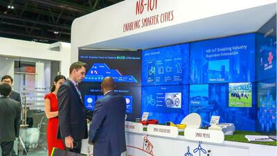 Above, the NB-10T booth featuring several types of smart devices from pet tracking to smart agriculture. Victor Besa for The National