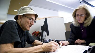 Above, a state worker goes over his retirement options with a Calpers Retirement Program specialist in California. Old people are living longer, and their consumption needs are growing, especially costly medical treatments, says Omar Al Ubaydli. Max Whittaker / Reuters