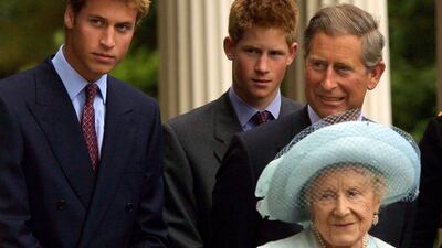 2001: Prince William, Prince Harry and Prince Charles appear with the Queen Mother during celebrations to mark her 101st birthday in London. Getty Images