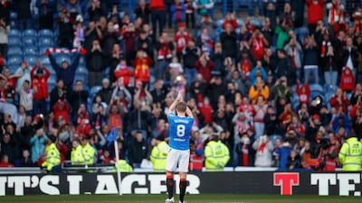 Steven Gerrard applauds the travelling Liverpool supporters during the legends match at Ibrox Stadium. Press Association