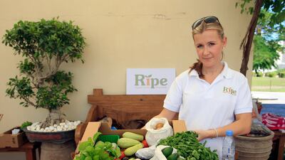 ABU DHABI - 18NOV2011 - Becky Balderstone, Ripe Manager selling organic mix vegetables at farmers market at Khalifa Park yesterday in Abu Dhabi. Ravindranath K / The National