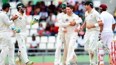 Even though Michael Clarke, centre, led Australia to a 2-0 Test series victory over the West Indies earlier in the week, both teams seem to be trending upwards. Emmanuel Dunand / AFP