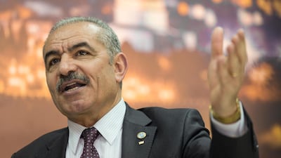 In this April 16, 2019 file photo, Palestinian Prime Minister Mohammad Shtayyeh gives an interview at his office in the West Bank city of Ramallah. AP