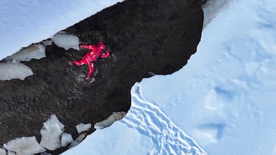 Tourists attired for the conditions float in the ice of the Erguna section of the Jirbugan River, experiencing 'ice floating' at minus 40°C in Hulunbuir City, Inner Mongolia Autonomous Region, China. AFP