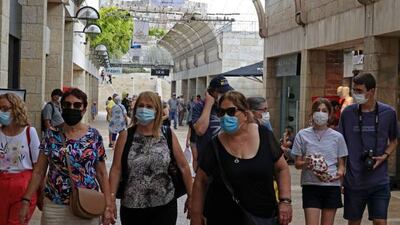 People at a market in Jerusalem, on August 11, 2021. Getty