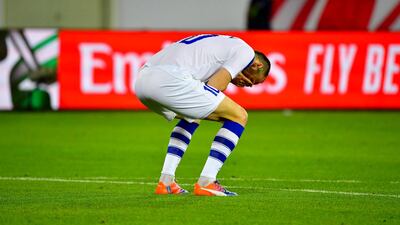 Uzbekistan forward Marat Bikmaev saw his spot kick saved. AFP