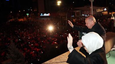 Turkish president Recep Tayyip Erdogan and his wife Emine greeting their supporters at the balcony of his ruling Justice and Development Party (AK Party) after early results of local election in Ankara. EPA