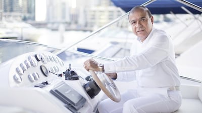 Bimal Bhatia on his Gulf Craft Majesty 56 yacht at Dubai Marina. Reem Mohammed / The National