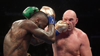 Deontay Wilder connects with Tyson Fury. AP Photo