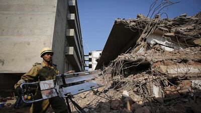 A rescue worker carries a stretcher at the site of a collapsed building that was under construction in Canacona town in the western Indian city of Goa. Reuters/Danish Siddiqui