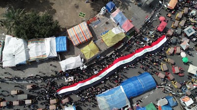 An aerial picture taken by a drone shows Iraqi protesters at the Al-Tahrir square in central Baghdad, Iraq. EPA