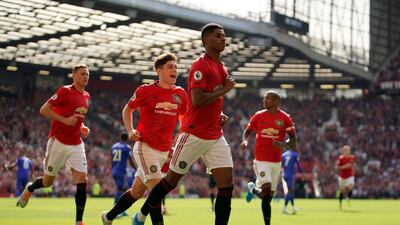 Manchester United's Marcus Rashford celebrates after scoring from the spot against Leicester. AFP