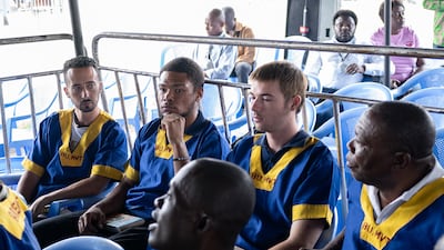 Some of the 51 defendants on trial for a coup attempt wait to hear the verdict in their trial on September 13. EPA