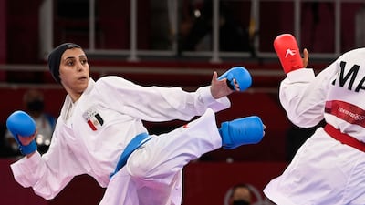 Bronze-medal winning Giana Lotfy (L), of Egypt, competes against Morocco's Btissam Sadini in the women's kumite +61kg karate.