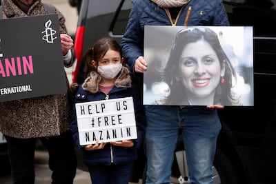 Gabriella Ratcliffe, daughter of British-Iranian aid worker Nazanin Zaghari-Ratcliffe, protests outside the Iranian Embassy in London. Reuters