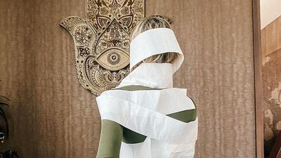 A funny shot from the couple's home edition of the Follow Me To series. Instagram/ @muradosmann