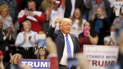 Republican presidential candidate Donald Trump gives a thumbs up as he is announced during a campaign event in Rock Hill, South Carolina on January 8, 2016. Reuters