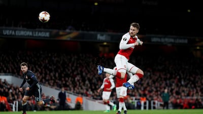 Arsenal's Aaron Ramsey scores the team's spectacular third goal. REUTERS/Eddie Keogh