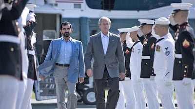 Sheikh Mohammed with US President George W Bush at Camp David, Maryland, in August 2008. AFP