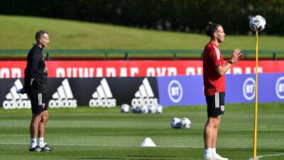 Gareth Bale and Wales manager Ryan Giggs. PA