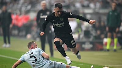FRANKFURT AM MAIN, GERMANY - MAY 05: Filip Kostic of Eintracht Frankfurt is challenged by Vladimir Coufal of West Ham United during the UEFA Europa League Semi Final Leg Two match between Eintracht Frankfurt and West Ham United at Deutsche Bank Park on May 05, 2022 in Frankfurt am Main, Germany. (Photo by Matthias Hangst / Getty Images)