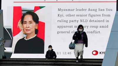 A screen showing the news on the Myanmar situation on Monday in Tokyo. AP Photo