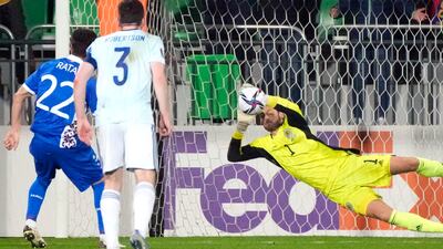 Scotland's goalkeeper Craig Gordon saves a penalty against Moldova. AP