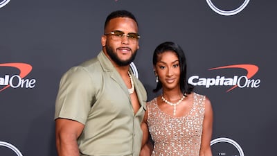 NFL player Aaron Donald of the Los Angeles Rams, left, and Erica Donald arrive. AP